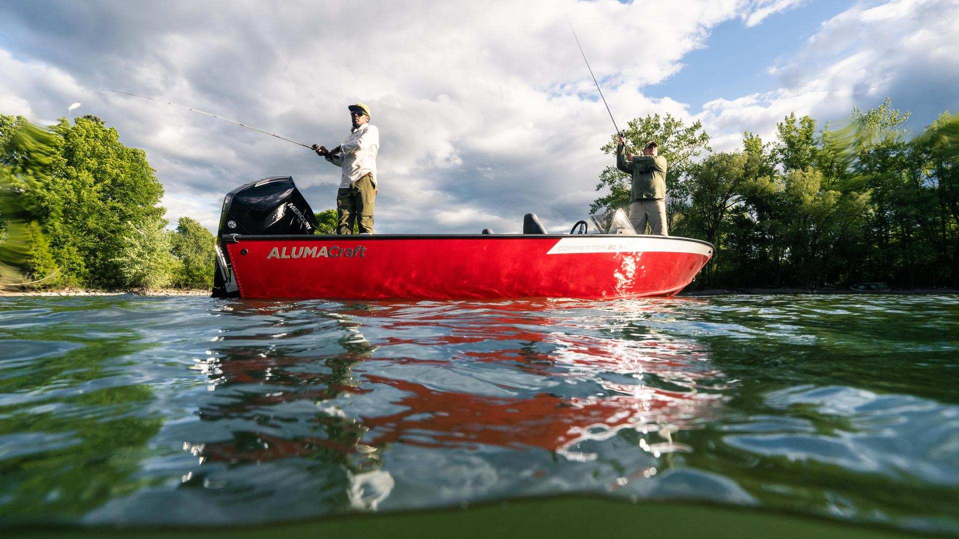 Two men fishing on an Alumacraft Competitor 205X 2025 aluminum boat