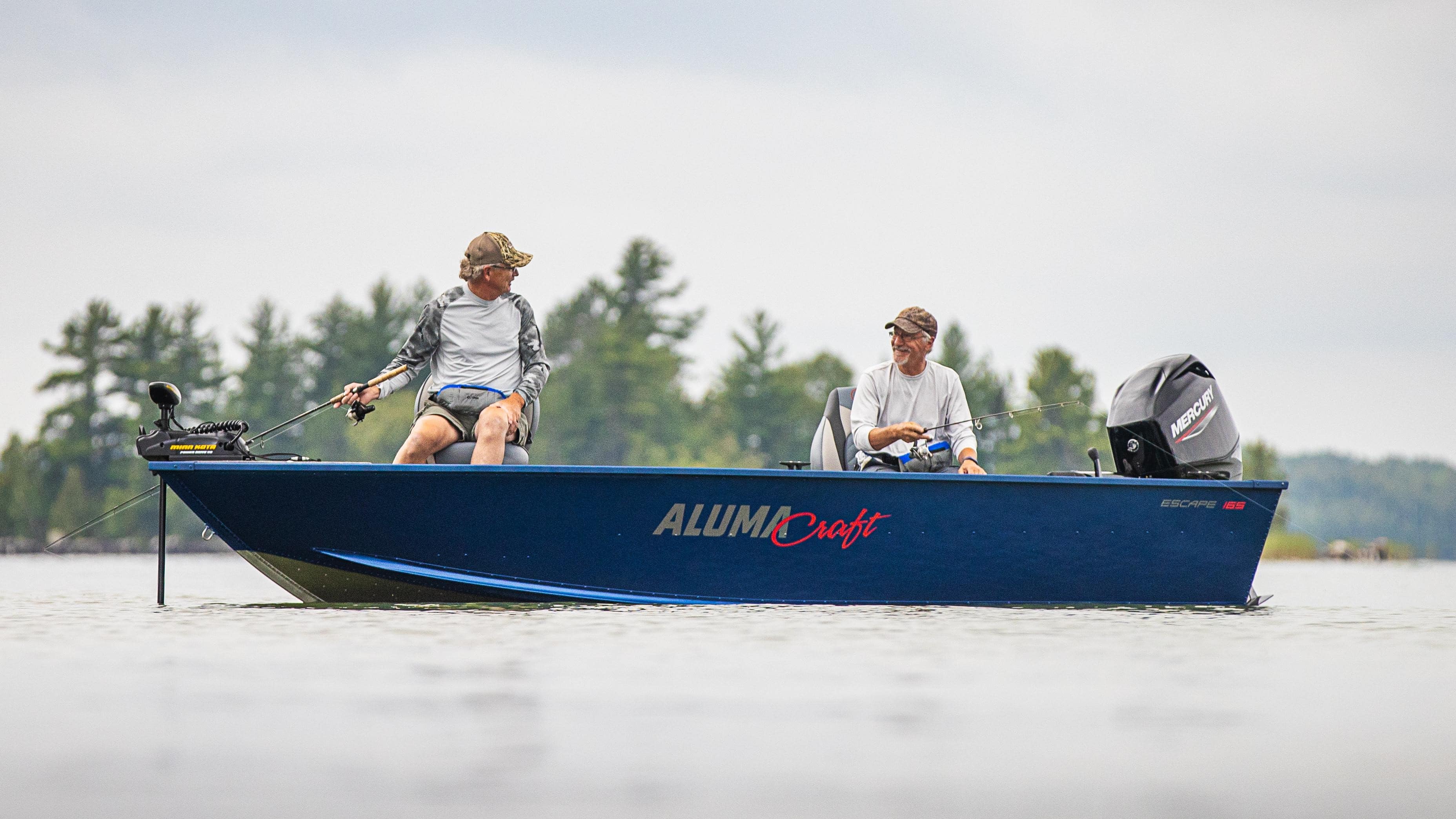 Two men fishing on a multi-species Alumacraft Escape 165 2025