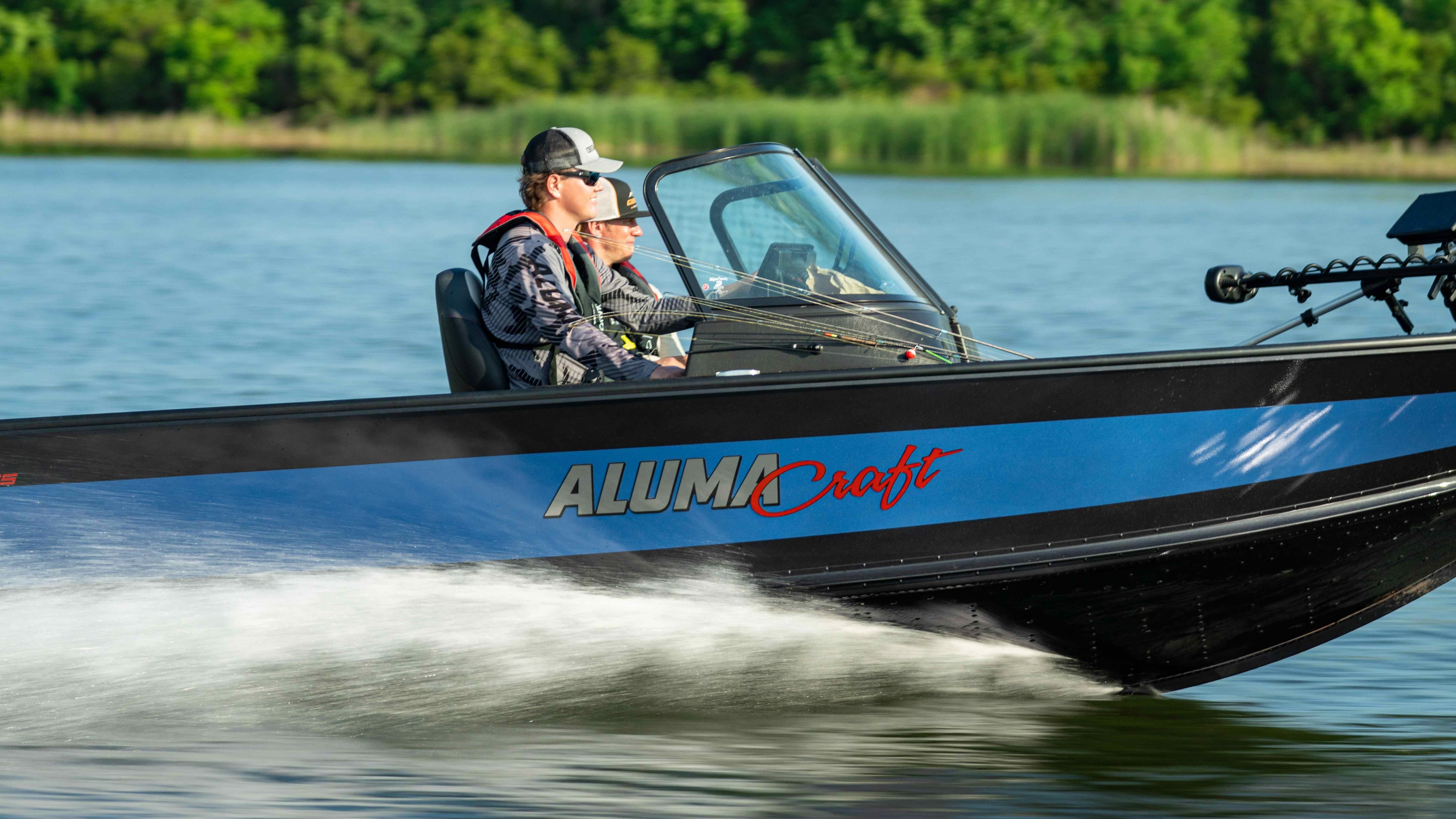Couple of friends going bass fishing in alumacraft competitor 
