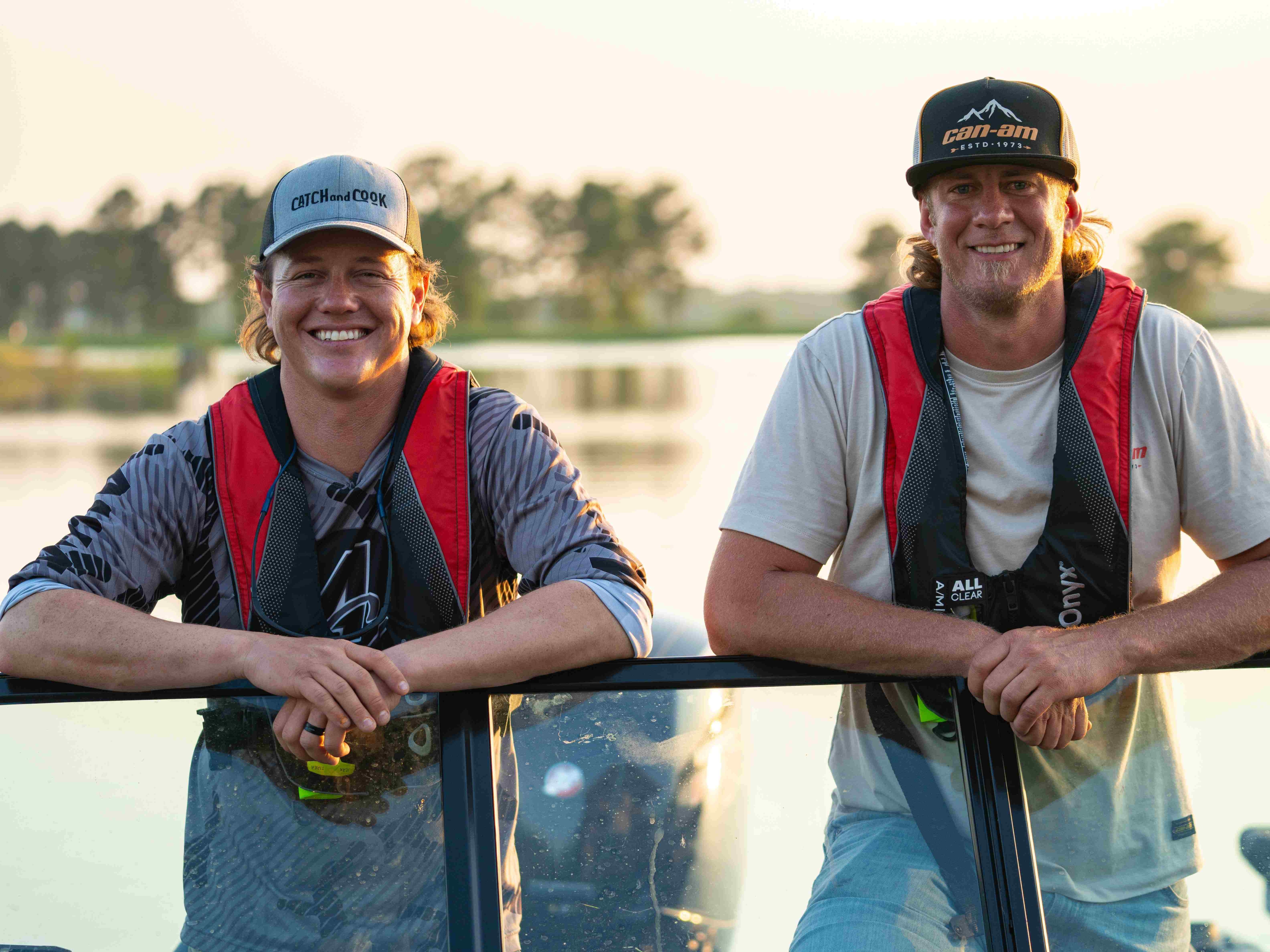Jay Siemens and Dustin Jones on alumacraft boat during sunset fishing
