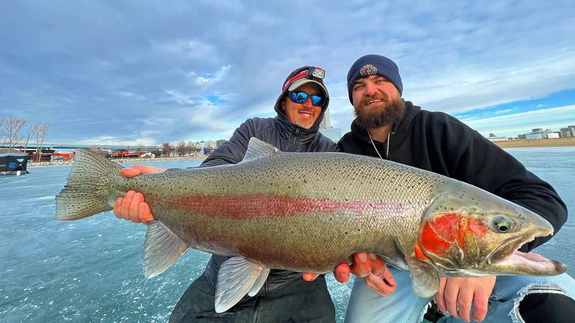 Alumacraft ambassador Eric Haataja and his friend showing their catch from their aluminum fishing boat
