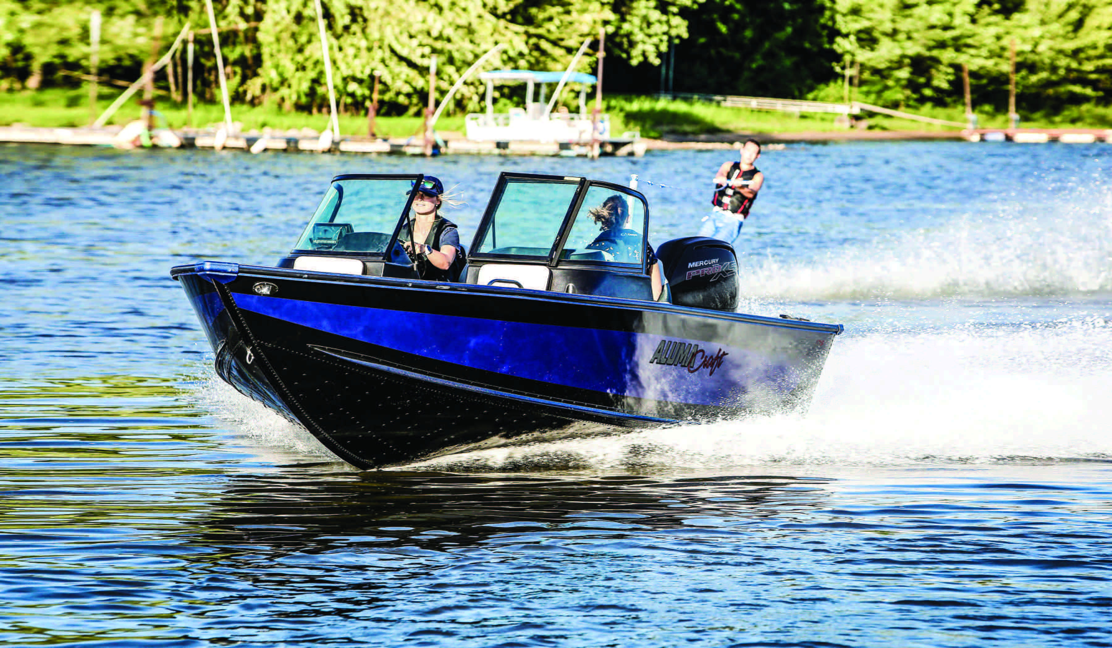 Boy water skiing behind a boat