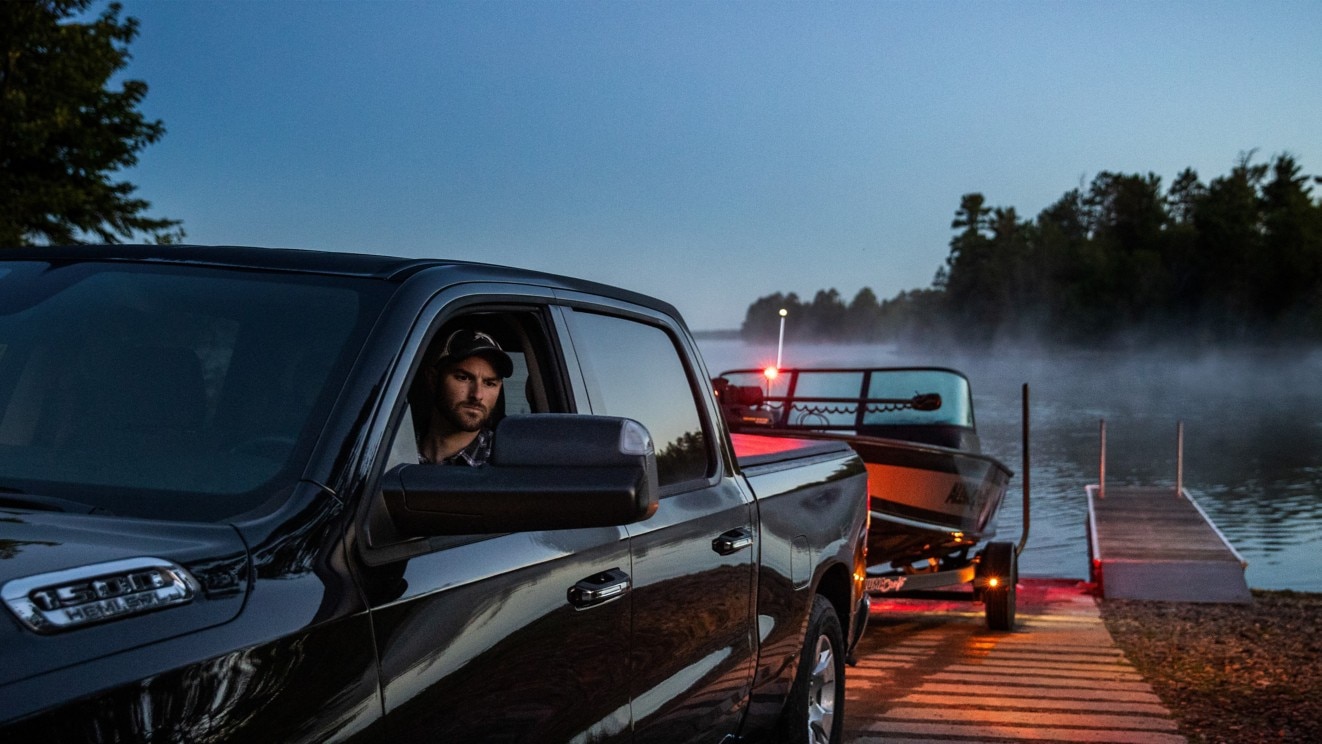 Man launching his Alumacraft Fishing Boat