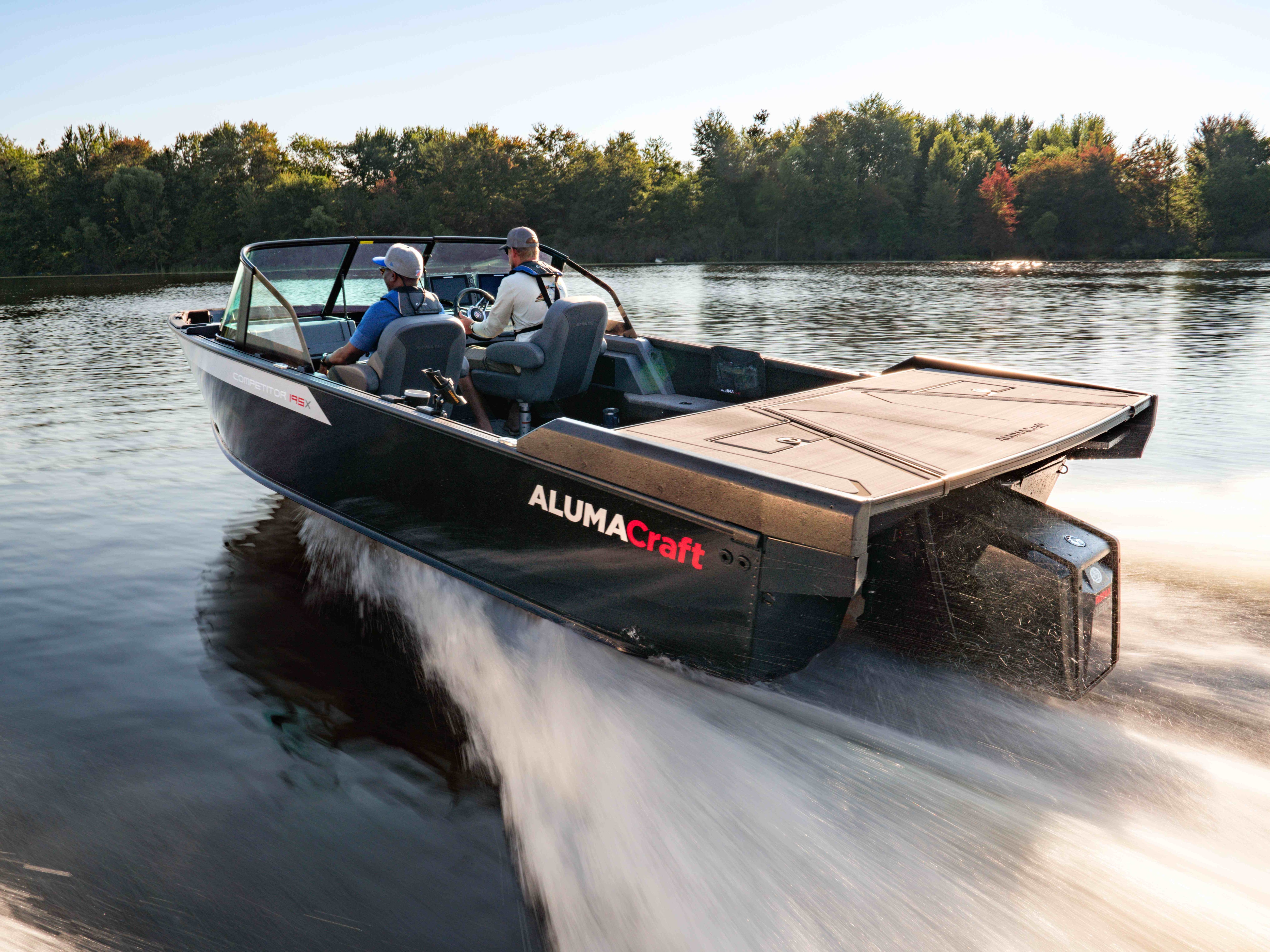 Fishermen riding a 2023 Alumacraft Competitor MAX aluminum fishing boat