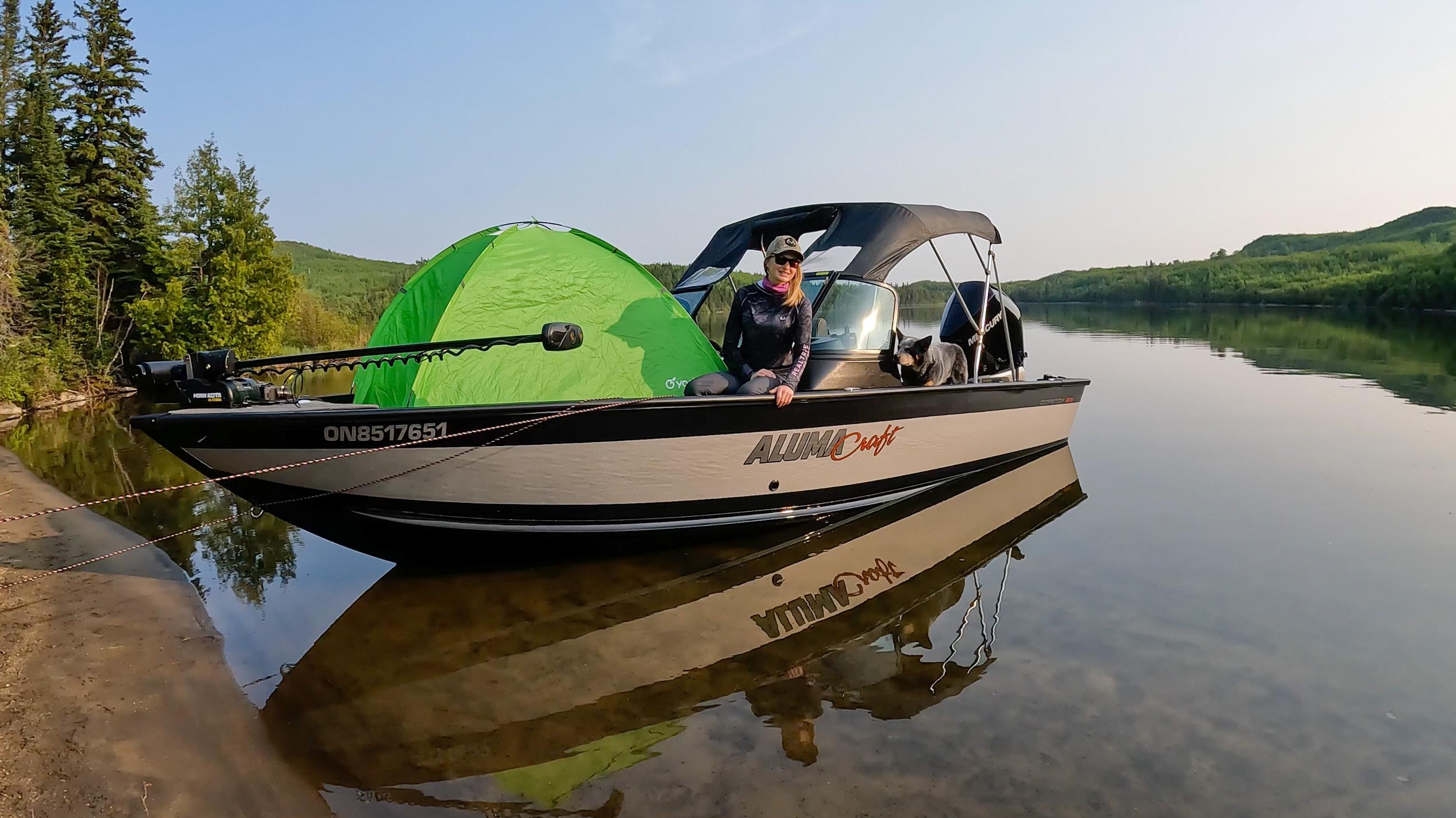 Rebekka Redd fishing from her Alumacraft fishing boat