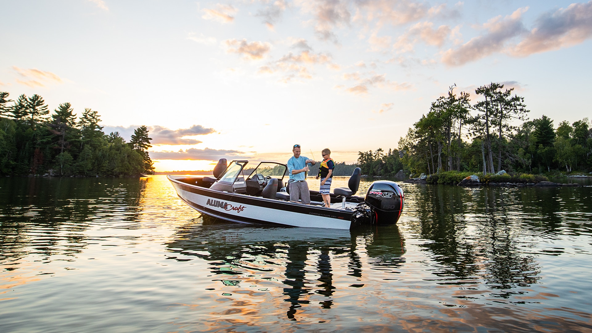 father and son fishing on lake vermillion in alumacraft competitor fsx