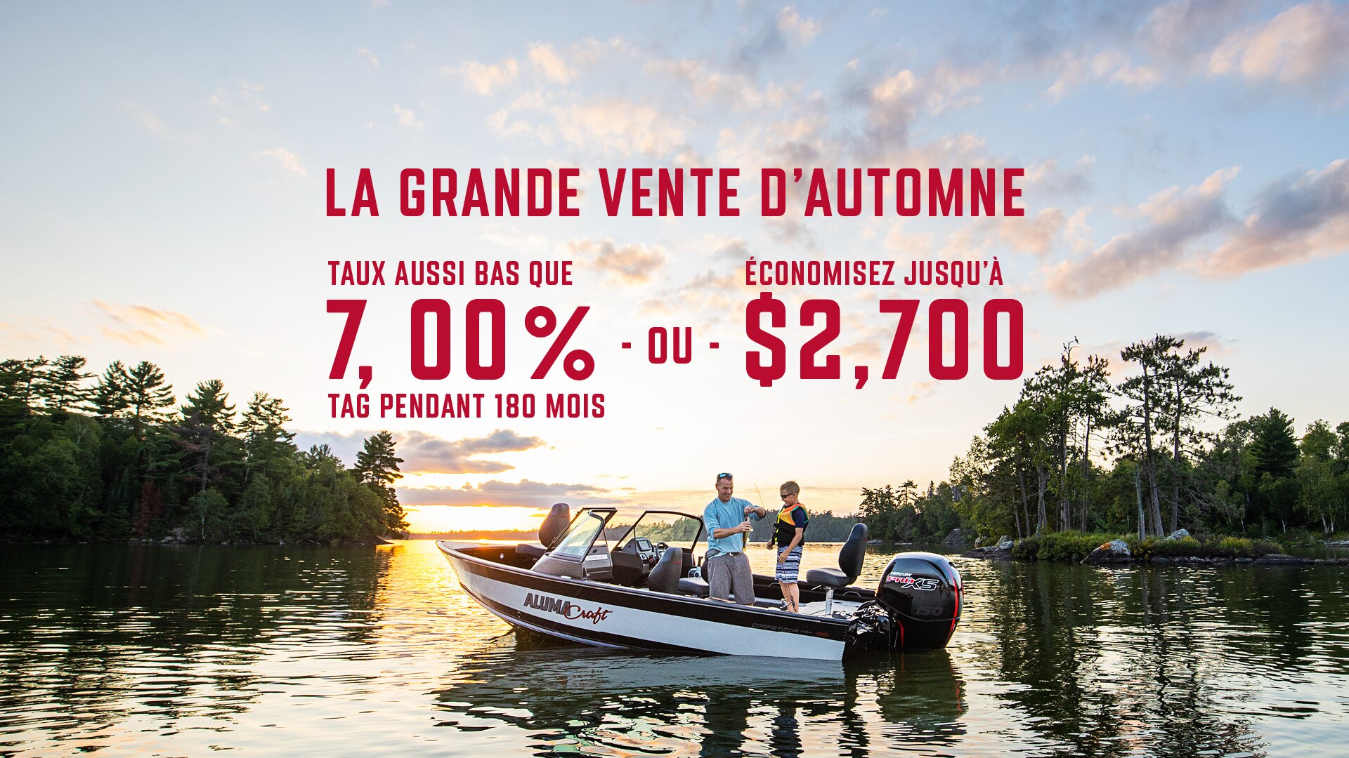 Père et fils pêchant au levé du soleil