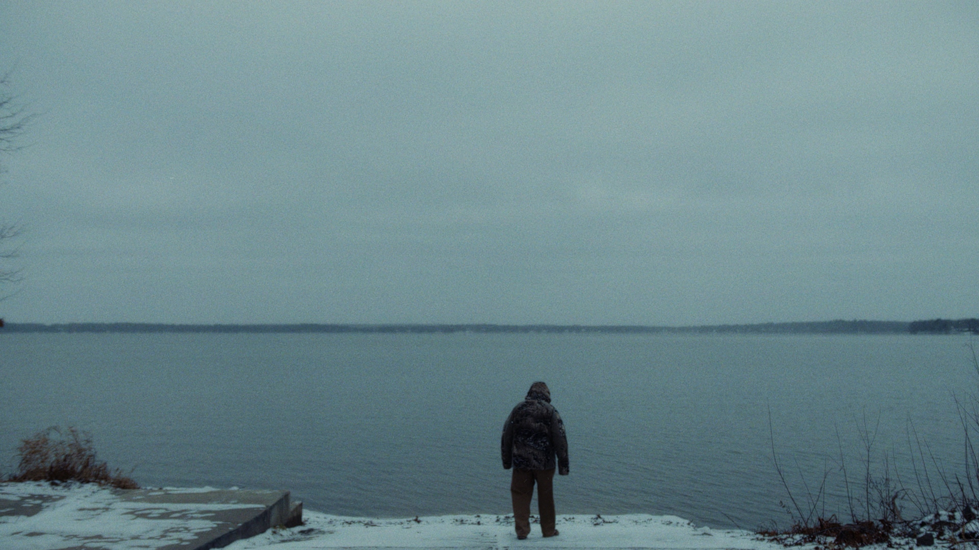 Ramsell aka &ldquo;MuskieMan&rdquo; in front of a lake in winter