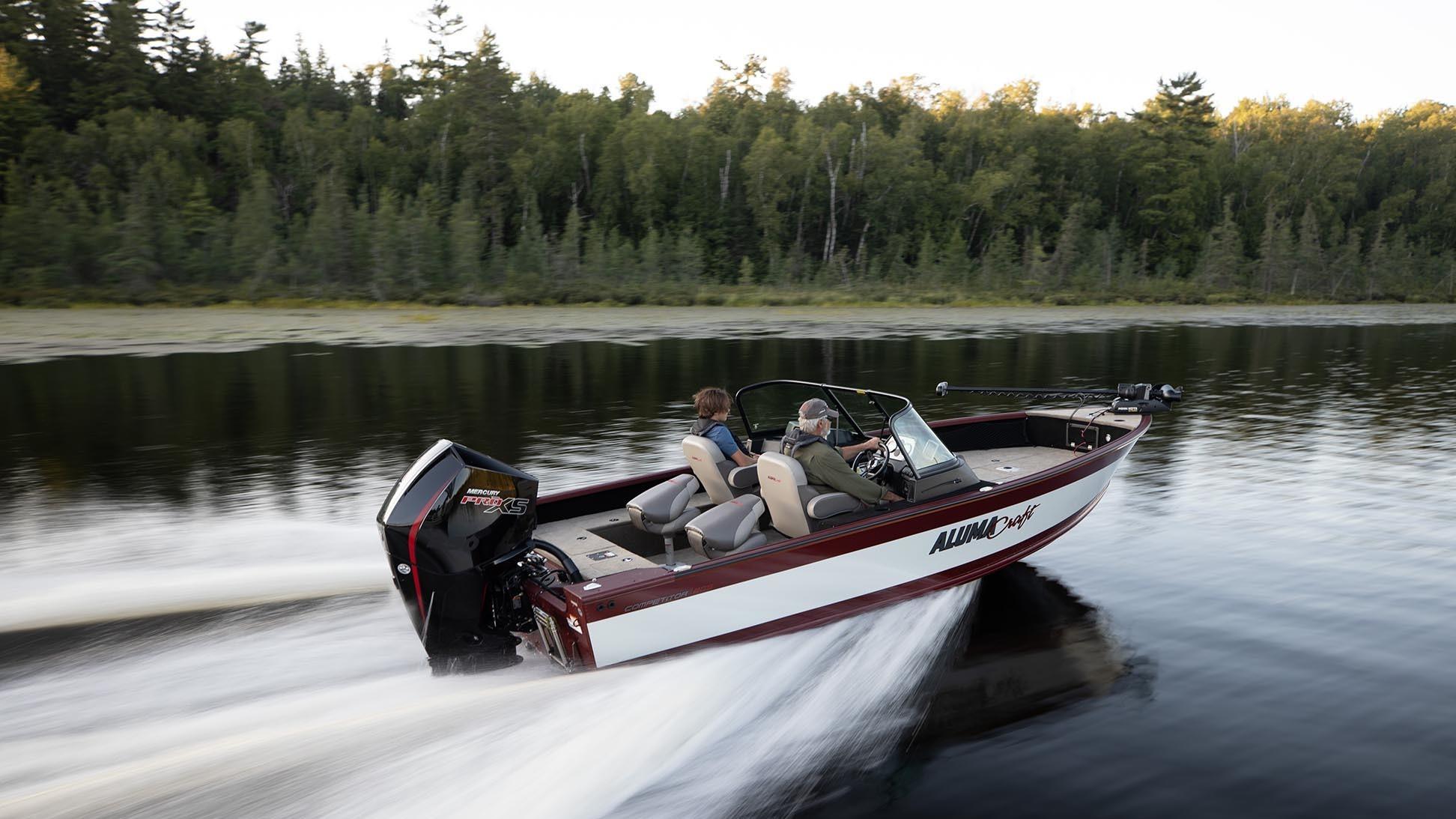 Man with his son fishing from an Alumacraft aluminum fishing boat