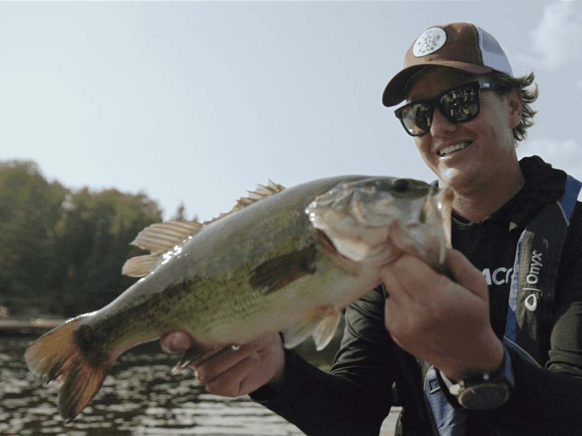 A smiling Jay Siemens after catching a fish