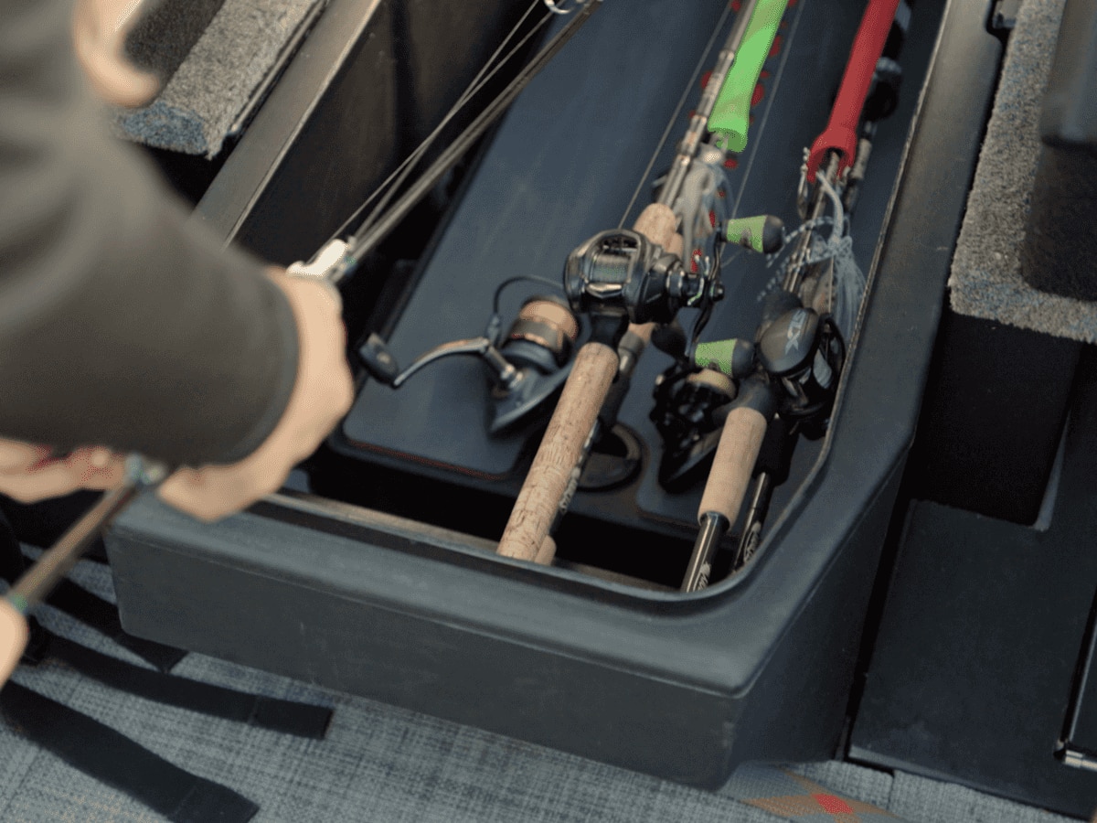 Close-up of fishing rods stored in an Alumacraft boat